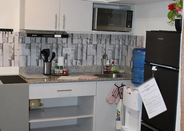 Aparthotel Cozy & Convenient 1-bedroom 3 Mins Away From The Airport Lapu-Lapu City